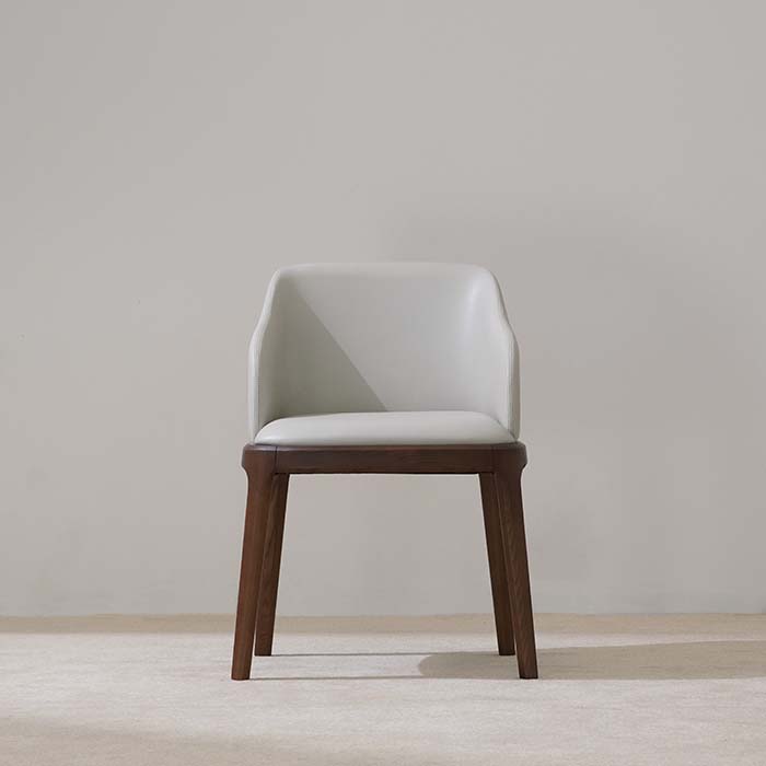 Fauteuil de salle à manger moderne rembourré en cuir blanc avec pieds en bois